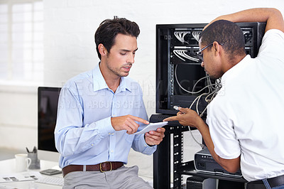 Buy stock photo Server room, it support and instructions with a man technician talking to a business person about cyber security. Network, database and explain with an engineer chatting about information technology