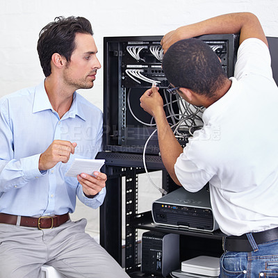 Buy stock photo Server room, businessman or electrician fixing cables for maintenance after digital glitch in office. Network, hardware or worker with a technician or electrical engineer for information technology