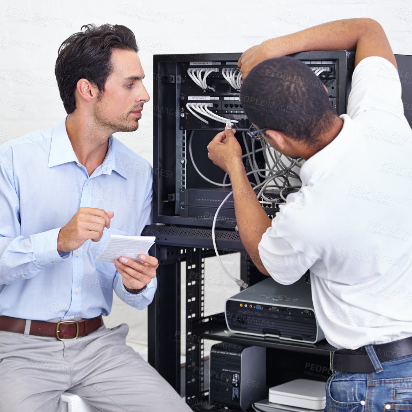 Buy stock photo Server room, businessman or electrician fixing cables for maintenance after digital glitch in office. Network, hardware or worker with a technician or electrical engineer for information technology