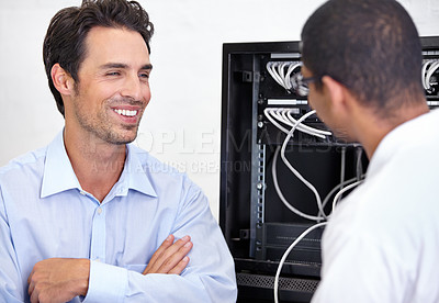 Buy stock photo Server room, it support and network with an engineer talking to a business man about cyber security. Database, consulting and maintenance with a technician chatting about information technology