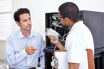 Buy stock photo Server room, it support and wires with an engineer talking to a business man about hardware or cable replacement. Network, database and spare parts with a technician explaining information technology