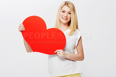 Buy stock photo Woman, portrait and heart or poster mockup as love message, announcement or bulletin. Female person, model and face or white background in studio as valentines gesture or billboard, placard or banner