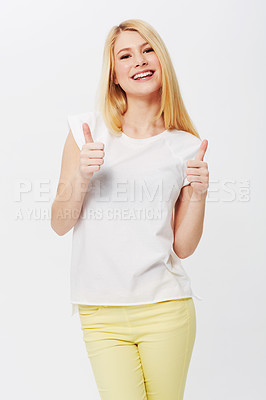 Buy stock photo Happy woman, thumbs up or smile in studio portrait with confidence, yes or success by white background. Girl, proud or model with review, hand gesture or agreement for winning, goals or achievement