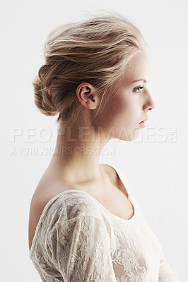 Buy stock photo A stunning young woman looking away thoughtfully
