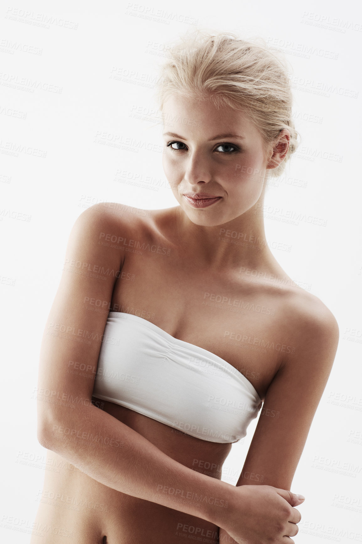 Buy stock photo A pretty young blonde woman isolated on a white background