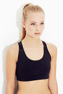 Buy stock photo A young woman posing in sportswear