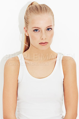 Buy stock photo Portrait, workout and serious young woman in studio isolated on a white background. Face, healthy body and person exercise, blonde athlete training and sportswear for physical fitness in Switzerland