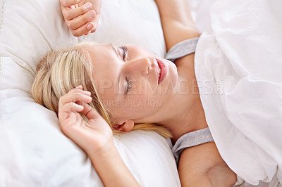 Buy stock photo Peace, sleeping and tired woman in a bed resting, dreaming and comfortable in her home. Eyes closed, face and female person asleep in a bedroom with vacation, holiday or snooze on day off in a house