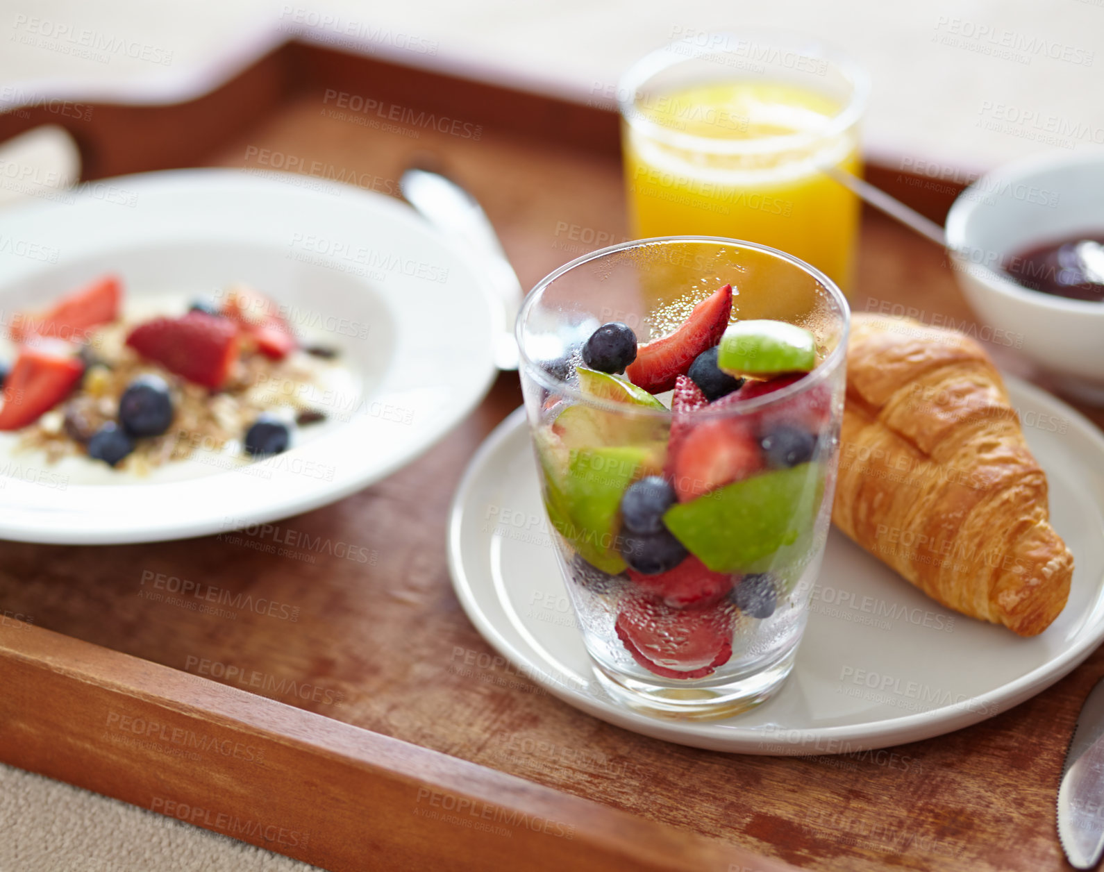 Buy stock photo Wellness, food and closeup of breakfast tray with muesli for balance, benefits or gut health. Fruit, zoom and croissant with vitamins for diet, nutrition or healthy eating, brunch or superfoods salad