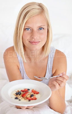 Buy stock photo Breakfast, portrait and woman in a bed with muesli, meal or berries for balance, wellness or gut health at home. Fruit, eating or female person face in bedroom for diet, nutrition or superfoods snack