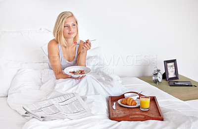 Buy stock photo Smile, thinking and breakfast with woman in bed of hotel to wake up for morning hospitality or accommodation. Relax, food and vacation with happy young blonde person in bedroom of home on weekend