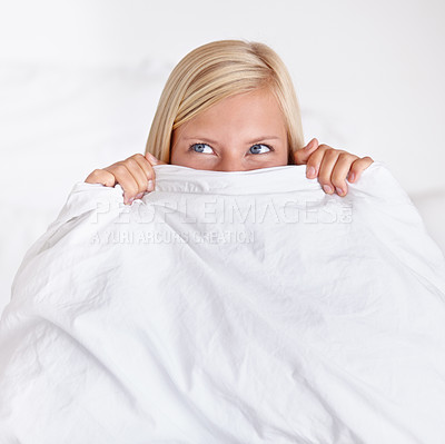 Buy stock photo Thinking, eyes and happy woman in a bed with blanket, hiding or waking up playful in her home. Morning energy, hands and cute female person with good mood, attitude or positive mindset in a bedroom 