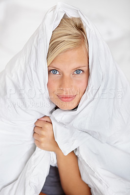 Buy stock photo Bed, portrait and blanket to cover woman in morning or home with warm sheet on body. Cosy, girl and duvet on head of person to wake up on holiday or vacation wrapped in linen for comfort in bedroom