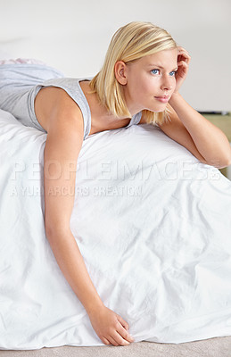 Buy stock photo Relax, thinking and woman in bedroom of hotel on weekend for luxury hospitality or accommodation. Home, vision and morning wake up with cozy young blonde person lying on bed of guest house apartment
