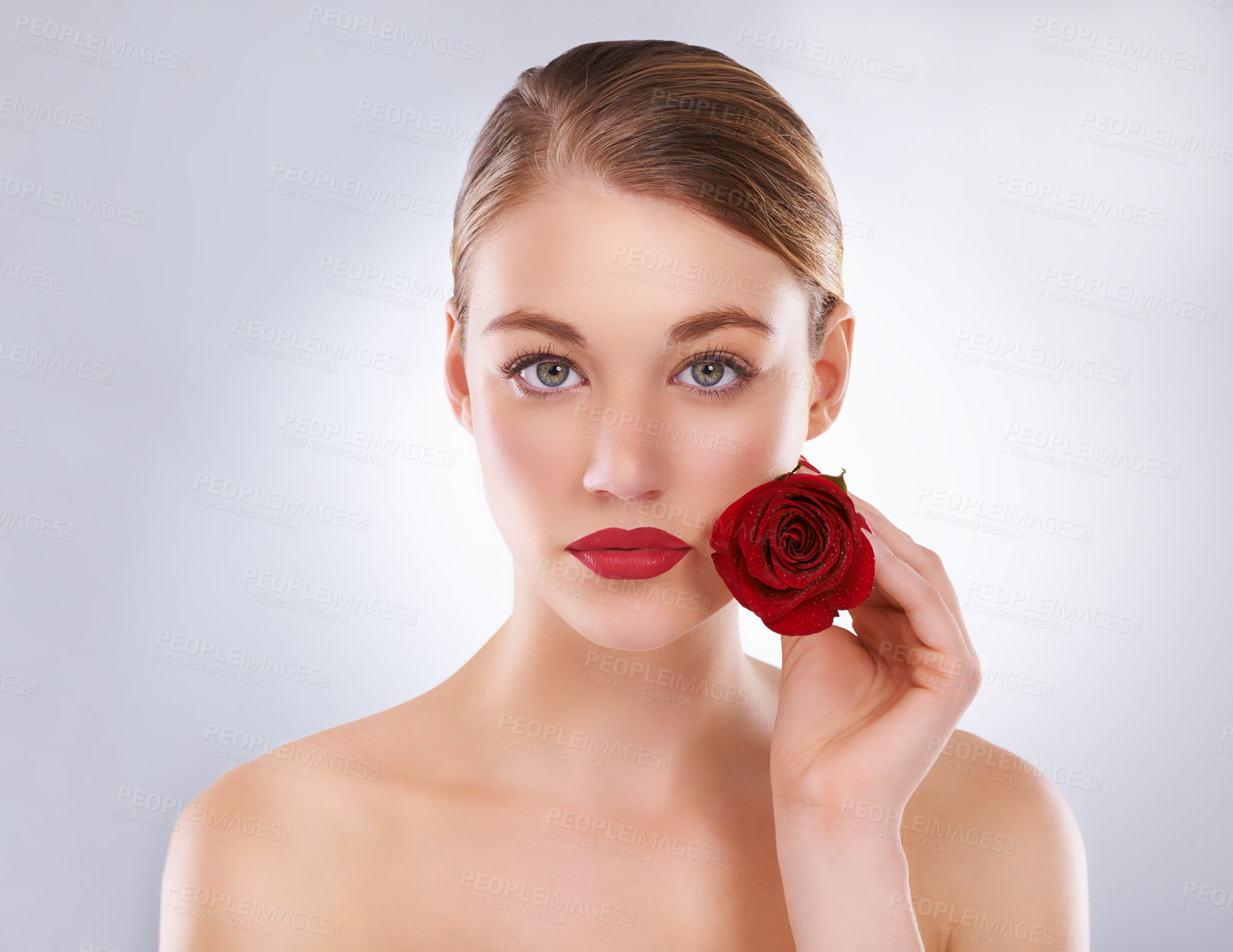 Buy stock photo Portrait, rose and woman with skincare, wellness and dermatology on a white studio background. Face, person and model with flowers and grooming with natural cosmetics and beauty with shine and glow