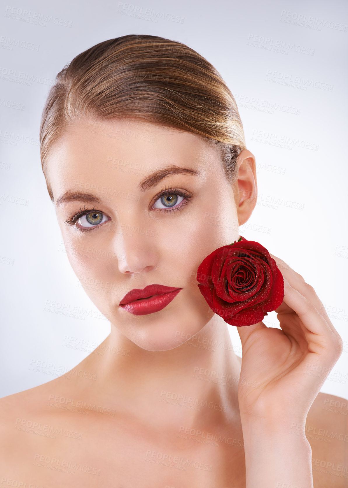 Buy stock photo Portrait, rose and woman with skincare, dermatology and beauty on a white studio background. Face, person and model with flowers and grooming with natural cosmetics and treatment with shine and glow