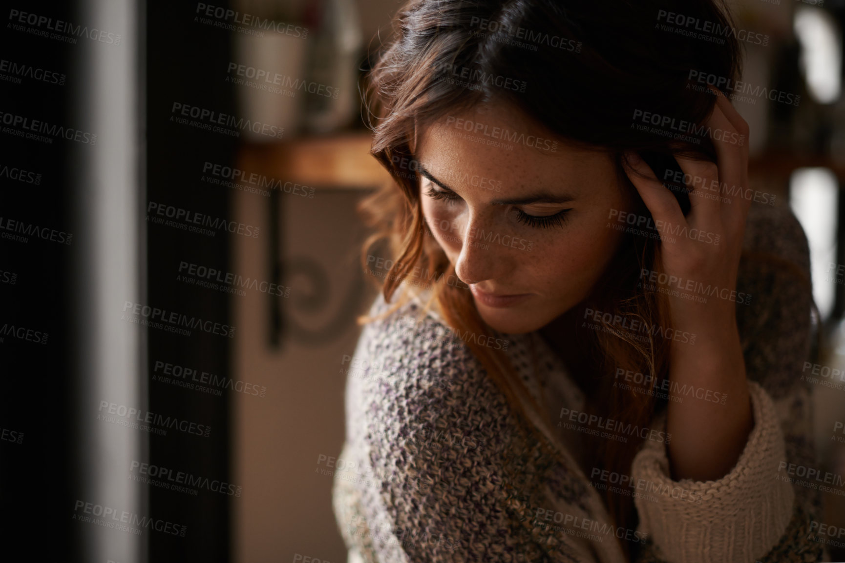 Buy stock photo Lonely, depression and young woman at a home with upset, grief and mad facial expression for problem. Mental health, emotion and sad female person looking down with unhappy face for loss at house.