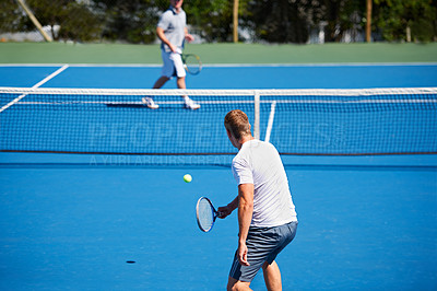 Buy stock photo Tennis, game and men with fitness, sports and competition with training and exercise. Players, friends and guys with rackets and court with workout and sunshine with challenge and cardio with a ball