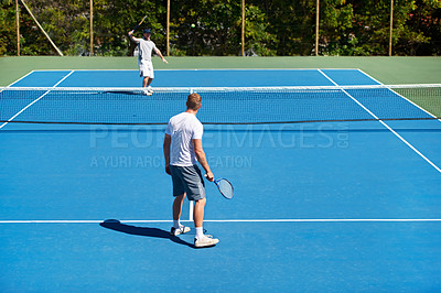 Buy stock photo People playing tennis on a tennis court