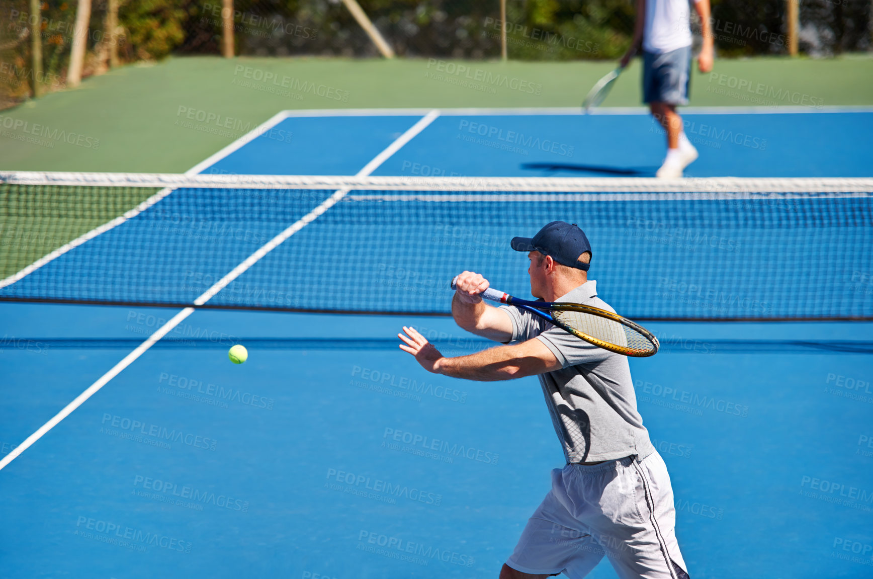 Buy stock photo Athlete, man and tennis on court with workout, competition and performance outdoor with fitness and energy. Sport, player and ball on turf for training, exercise and racket with serve, game and hobby