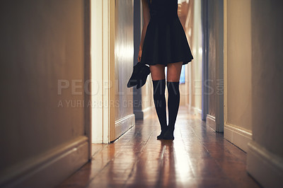 Buy stock photo Woman, legs and walking with shoes in hallway for fashion, clothing or outing at home. Closeup of young female person in dress and leggings by door for sneaking, silence or quiet foot steps at house