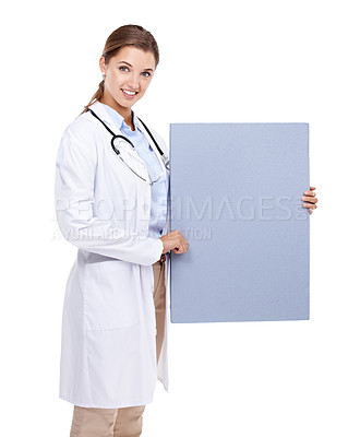 Buy stock photo Sign, poster and happy portrait of doctor in white background, studio and mock up space. Medical, information and woman with board, presentation and paper for news in healthcare, hospital or clinic