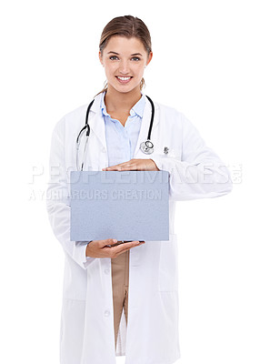 Buy stock photo Sign, board and happy portrait of doctor in white background, studio and mock up space. Medical, information and woman with poster, presentation and paper for news in healthcare, hospital or clinic