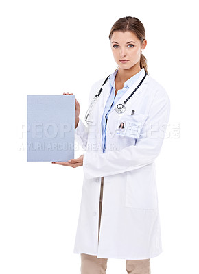 Buy stock photo Portrait of beautiful young doctor holding up a blank sign