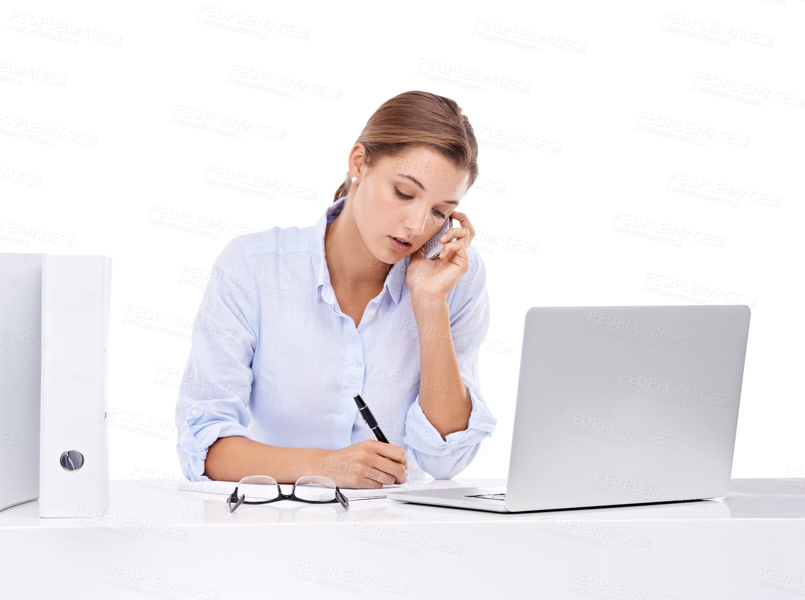 Buy stock photo Laptop, phone call and woman writing in studio for appointment information at secretary desk. Communication, notebook and female receptionist on mobile conversation with computer by white background.