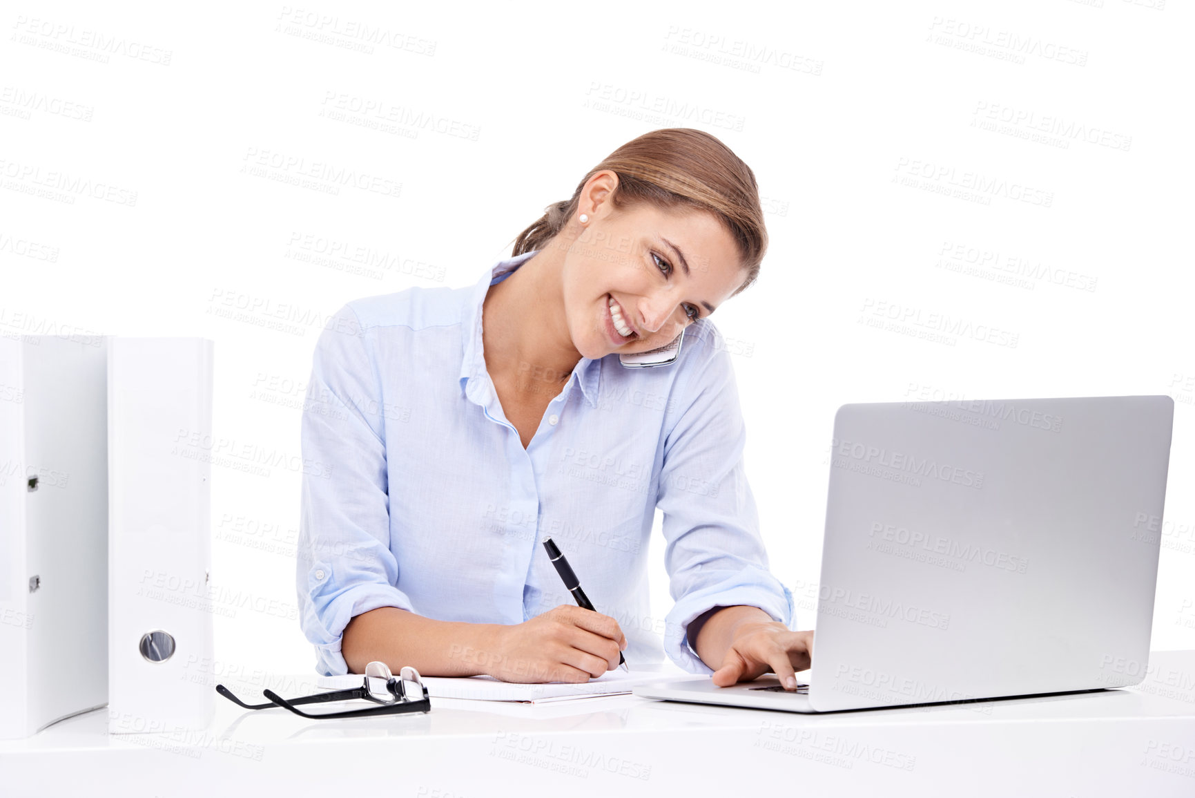 Buy stock photo Computer, phone call and woman writing in studio for appointment information at secretary desk. Communication, notebook and female receptionist on mobile conversation with laptop by white background.