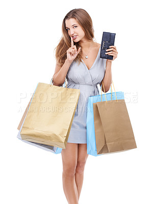 Buy stock photo Woman, portrait and shopping bags with finger on lips for secret purchase with wallet standing isolated on a white studio background. Attractive female with hand on lip carrying gifts for sneaky buy