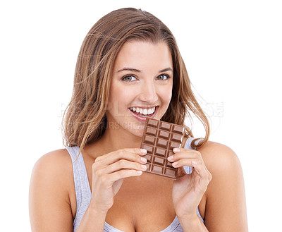 Buy stock photo Happy woman, eat chocolate and portrait with candy, sweet tooth and pleasure for craving sugar in studio background. Happy, snack and meal for comfort, dessert or sweets for calories, diet or tempt

