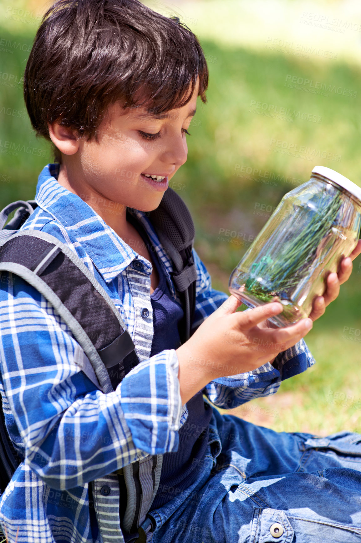 Buy stock photo Boy, kid and smile with jar in nature, exploring and learning on adventure, hiking in park or woods for fun. Happy, young explorer and camping, discovery and glass container for collecting bugs