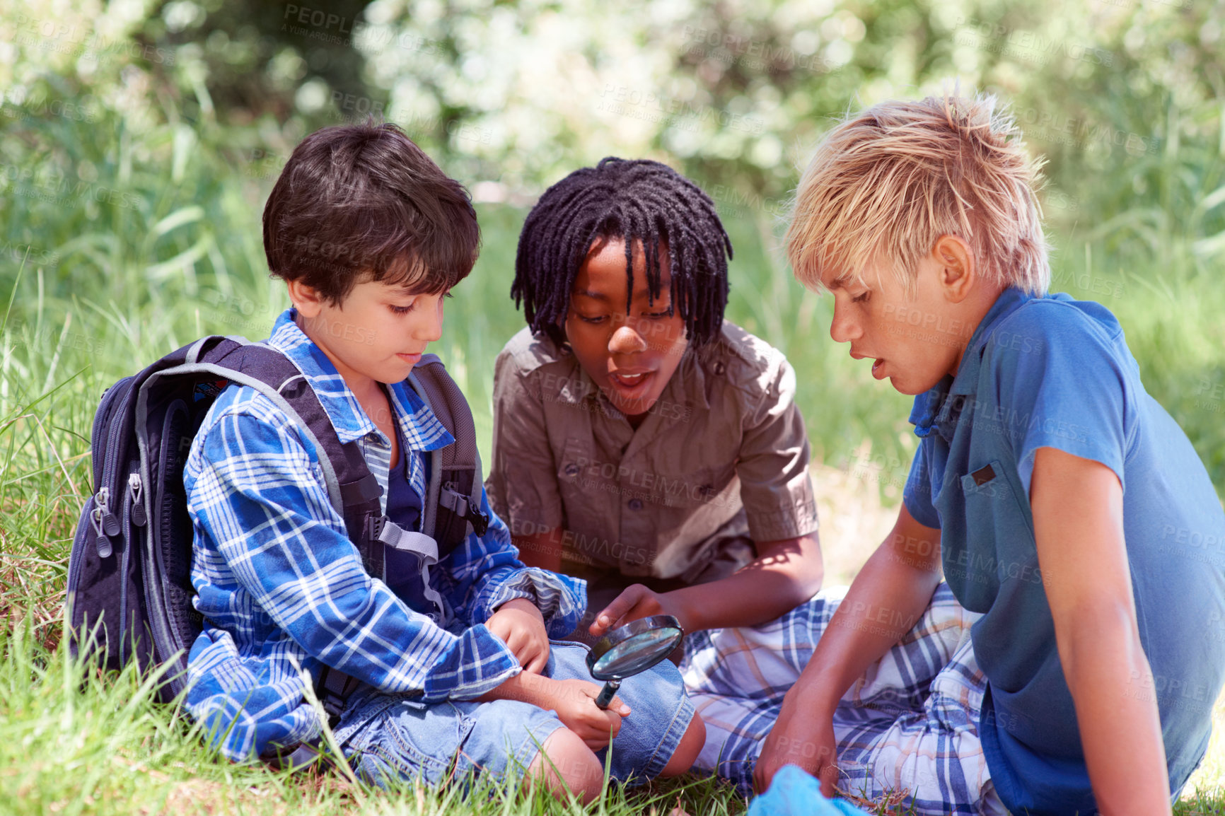 Buy stock photo Three little boys spending time outdoors together
