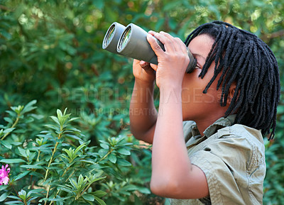 Buy stock photo Nature trees, binocular and black child watch wilderness view on adventure, outdoor exploration or camping trip. Environment, bush leaf and looking kid on sightseeing search in Amazon Rainforest