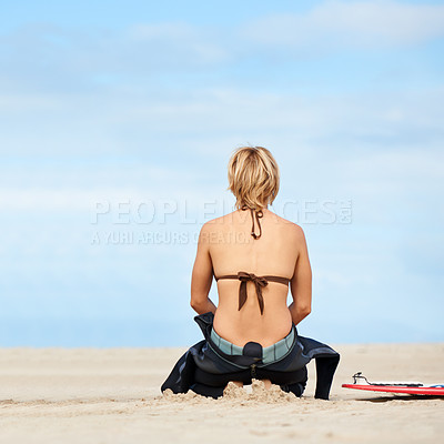 Buy stock photo Surfing, blue sky and woman with surfboard on beach for water sports training, wellness and fitness by ocean. Nature, waves and back of person for adventure on holiday, vacation and hobby by sea