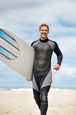 Buy stock photo Surfer, man with surfboard and walk on beach for fitness and extreme sports, wet suit and happy in the sun. Summer vacation, workout and surfing in nature, ocean and exercise with hobby in Australia