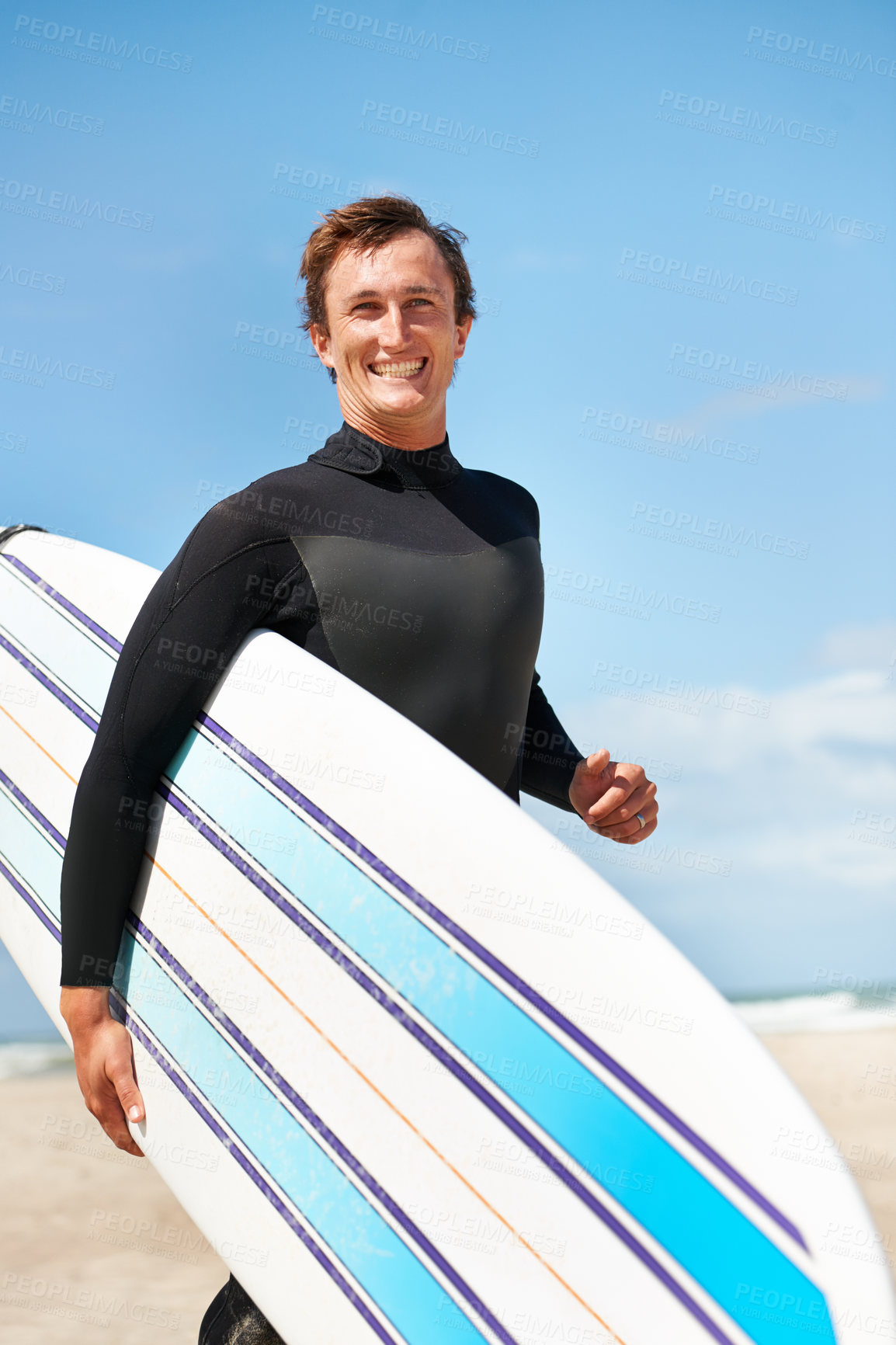 Buy stock photo Beach, smile and man with surfboard for exercise, fitness workout or body health in summer outdoor. Surfer, wetsuit and happy person by ocean for water sports, travel or holiday vacation in Hawaii