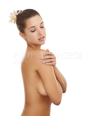 Buy stock photo Cropped shot of a gorgeous young woman posing nude against a white background