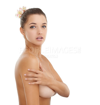 Buy stock photo Cropped portrait of a gorgeous young woman posing nude against a white background
