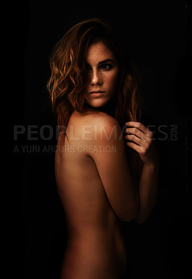 Buy stock photo Young woman, body and skincare in studio for cosmetics, dermatology and beauty with serious expression. Model or person in shadow art, self care or aesthetic with mystery on a dark, black background