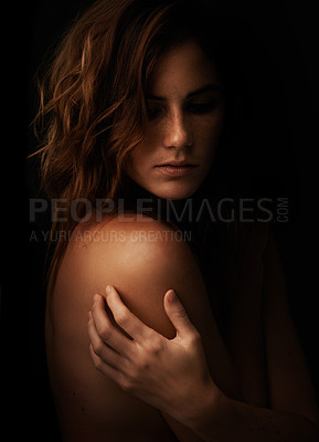 Buy stock photo Woman, body and skincare in studio for beauty, dermatology and shadow or light for art deco and aesthetic. Cosmetics model or serious  person with self care and creative on a dark or black background