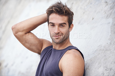 Buy stock photo Fashion, handsome and portrait of man by wall in trendy clothes, casual style and outfit in nature. Masculine, happy model and face of attractive person with confidence, pride or stylish on weekend