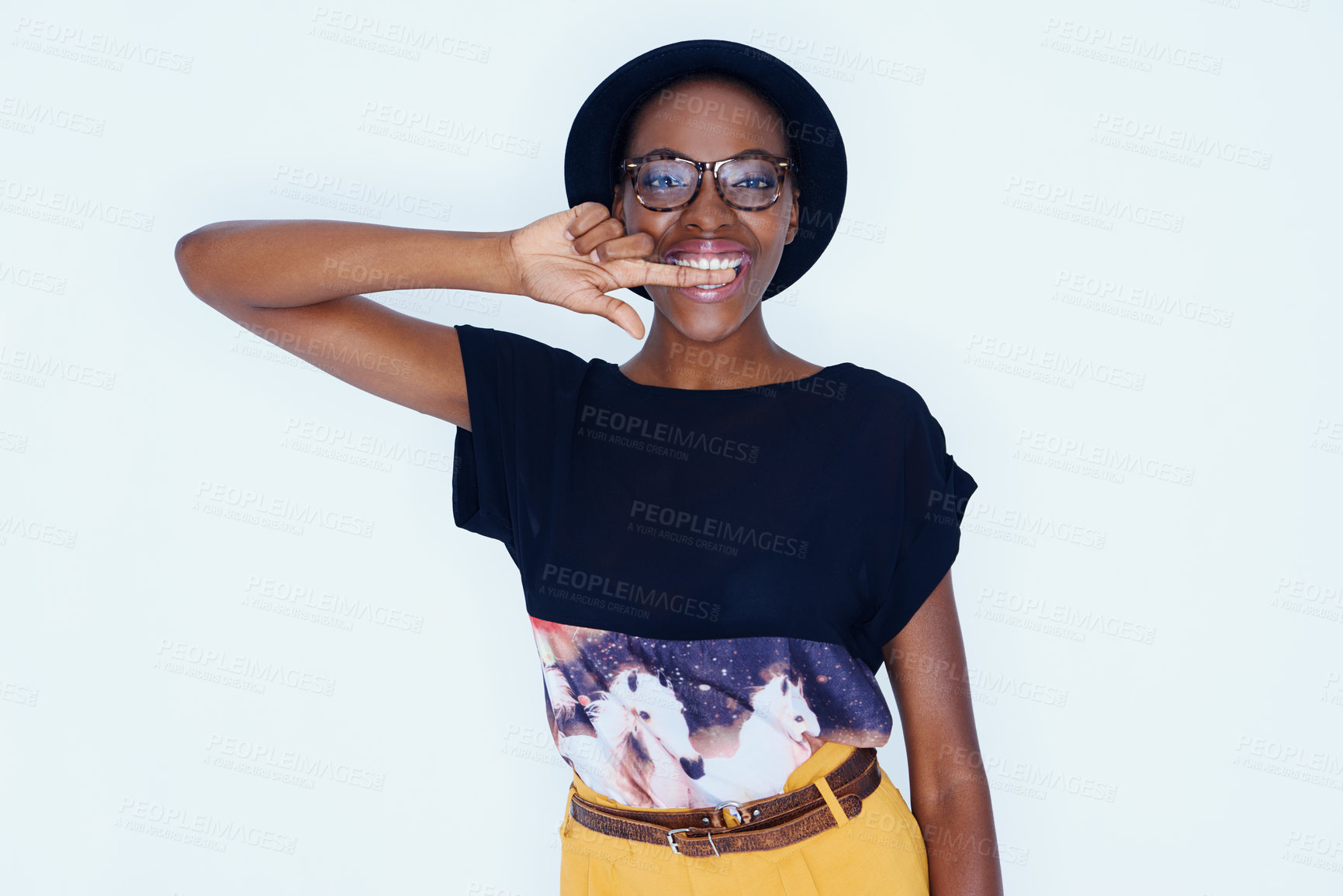 Buy stock photo Portrait, fashion and glasses with happy black woman in studio on white background for style. Model, smile and accessories with confident young hipster person biting finger in trendy clothes outfit