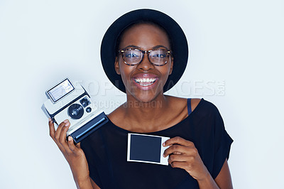 Buy stock photo Black woman, photograph and portrait in studio with camera, creativity and media for artist with creative talent. Young person, happiness and face for photoshoot, lens and focus by white background
