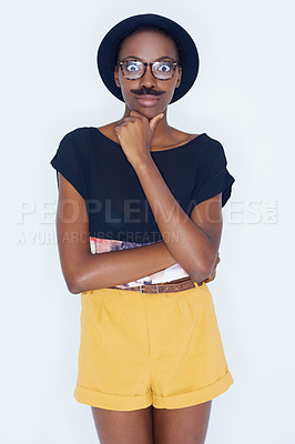 Buy stock photo Funny, portrait and black woman with mustache in studio with hipster fashion and crazy person in background. Silly, nerd and geek with goofy style and comedy joke with trendy hat or unique outfit