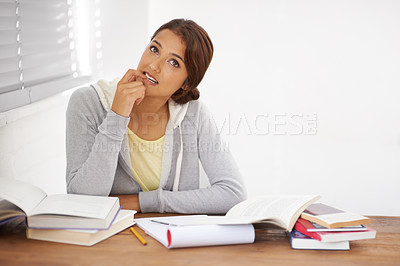 Buy stock photo Student, woman and thinking with books for learning, knowledge or education with idea for study in bedroom.
Young person, girl and thoughtful at desk with novel for scholarship, project or assessment