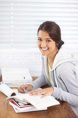 Buy stock photo Portrait, writing and happy woman studying in college, learning and reading for school project at desk. Face, books and student at table for education, knowledge and notes in university in Brazil