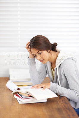 Buy stock photo Student, woman and reading with books for study, knowledge and confused with notes for learning in bedroom.
Young person, girl and frustrated at desk and novel for scholarship, project and assessment