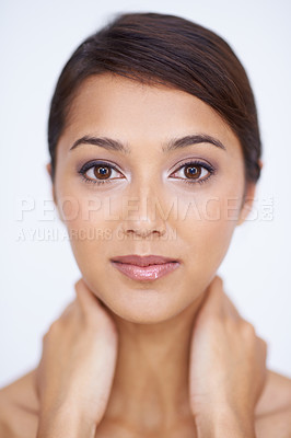 Buy stock photo Portrait, dermatology and woman with skincare, beauty and grooming on a white studio background. Face, Indian person and model with shine or wellness with healthy skin, smooth and glow with aesthetic